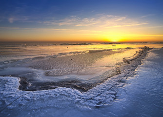 Sunset in the ice land. Beautiful winter landscape