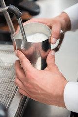 Barista doing your coffee