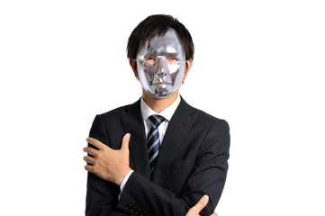 銀色の仮面を被ったスーツのビジネスマン