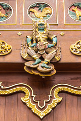 Thai giant Wood Carving on teak chapel