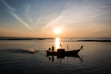 Fishing boat on sea,Silhouette