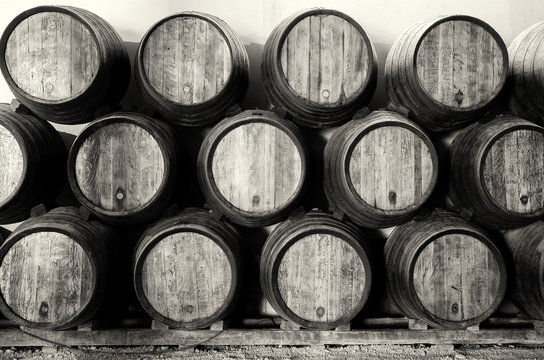 Whisky or wine barrels in black and white