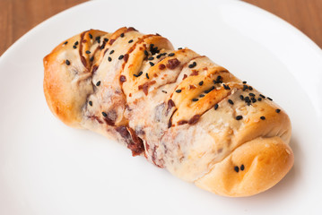 Red bean bun with sesame isolated on white background