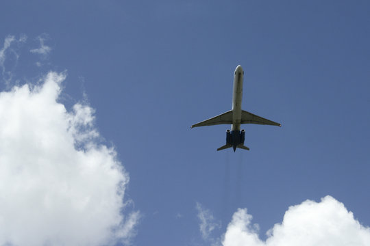Image of an airplane flying above