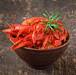 Fresh boiled crawfish on the old wooden background