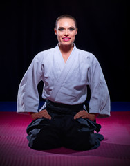 Smiling woman aikido fighter