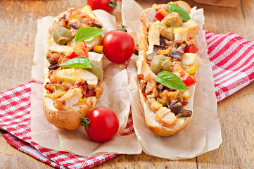 Big sandwich with roasted vegetables and chicken