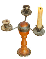 triple candlesholder with one lighted candle
