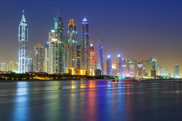 Fototapeta na wymiar Cityscape of Dubai at night, United Arab Emirates