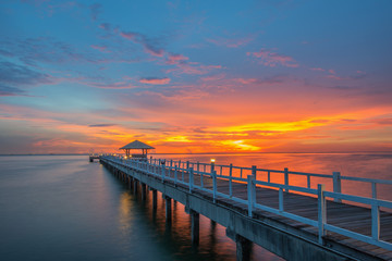 Landscape of Wooded bridge in the port between sunrise