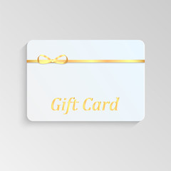 Gift card with a gold bow