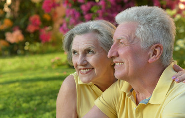 Retired couple outdoor in summer park