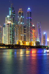 Fototapeta premium Cityscape of Dubai at night, United Arab Emirates