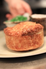 steak and mushroom pie with chips and peas