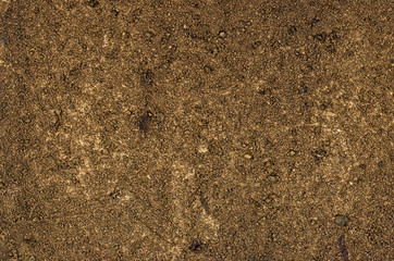 Detailaufnahme einer Leinwand mit Acrylfarbe und Sand