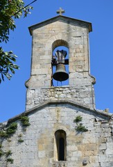 Bell-tower of ancient church in Southern France