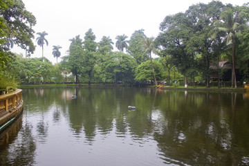Fototapeta na wymiar Pond in a garden at Ho Chi Minh's Residence in Hanoi, Vietnam