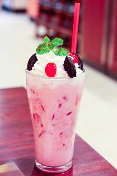 sweet and pink strawberry milkshake