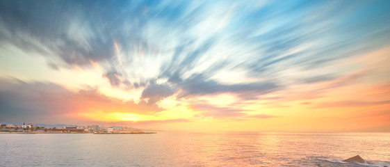Obraz na płótnie Canvas Barceloneta Beach in Barcelona at sunrise