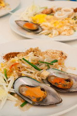 Seafood pad Thai dish of stir fried rice noodles