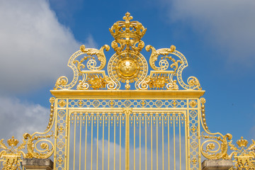 Beautiful gate of Versailles palace detailed fence near Paris is - obrazy, fototapety, plakaty