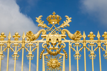 Fototapeta na wymiar Beautiful gate of Versailles palace detailed fence near Paris is