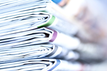 closeup stack of newspaper