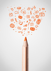 Pencil close-up with social media icons