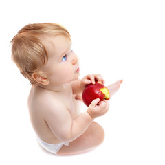 Cute infant boy with apple