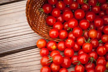 Cherry tomatoes on a  wooden background