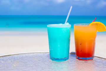 Two tasty cocktails on the white sandy beach