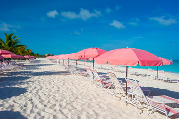 Beautiful white beach with sun loungers