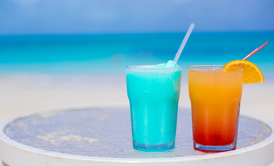 Two tasty cocktails on the white sandy beach