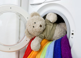 Washing machine, toy and colorful laundry to wash