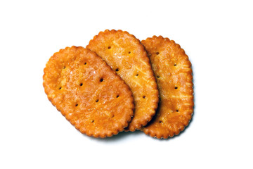 three oval crackers over white