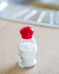 Salt shaker on table