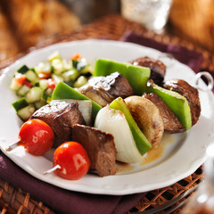 steak and vegetable shishkabobs with cucumber salad