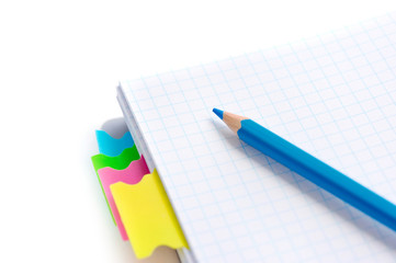 Notebook and pencil on the desk, close-up