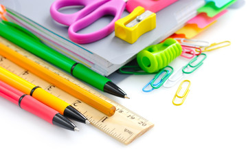 School office supplies on white background