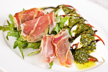 Caprese salad with parma ham