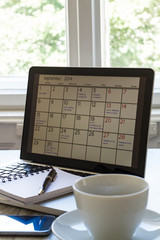 Checking monthly activities in the calendar in the laptop