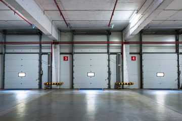 Doors for loading inside modern warehouse or storage, logistics concept