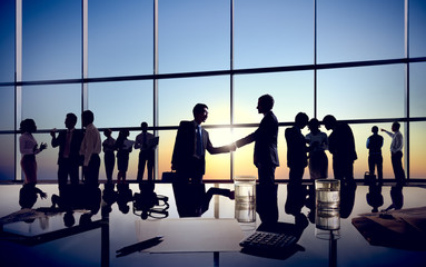 Two Isolated Businessmen Handshaking