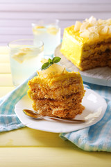 Tasty lemon dessert on wooden table