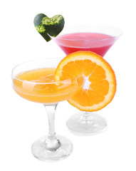 Watermelon and orange cocktails in glasses isolated on white