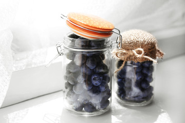 Fresh blueberries on window sill