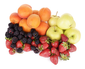 Ripe fruits and berries isolated on white