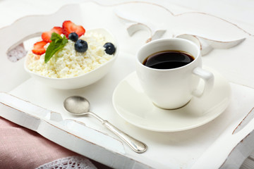 Delicious breakfast with coffee and cottage cheese
