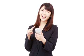 スマートフォンを持って喜ぶビジネスウーマン