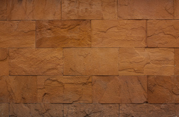 Background of stone wall made with blocks.